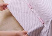 Increasing woman does not spread bedspread, instan