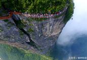 See a plank road built along a cliff of glass of H