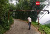 2.3 meters tall roadblock blocks ambulance village